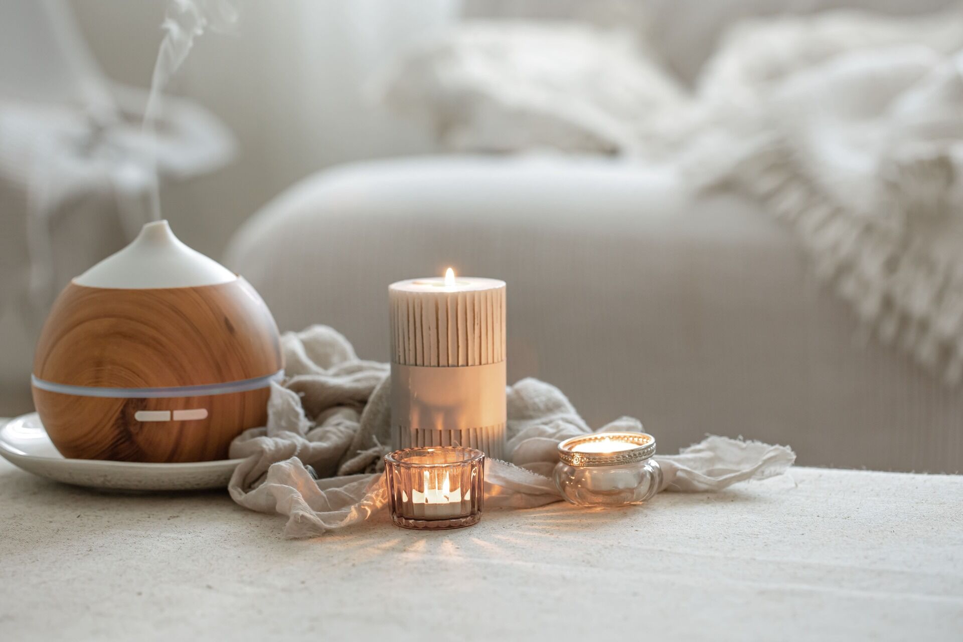 still-life-with-aroma-diffuser-moisturizing-air-burning-candles